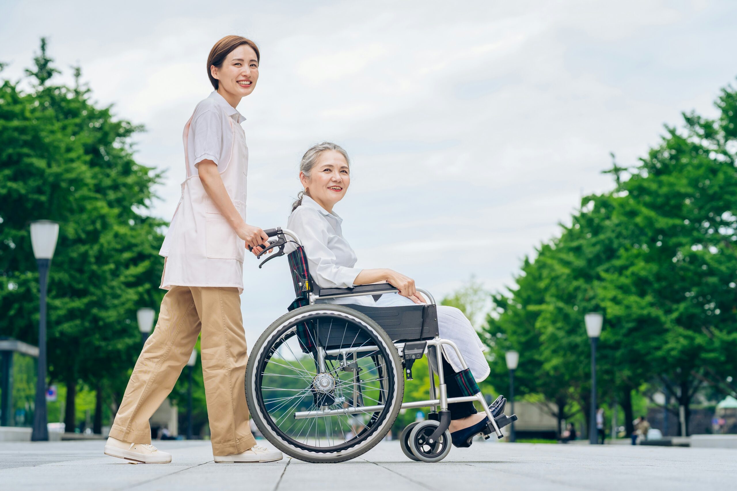 A caregiver with a patient before a medical transportation ride